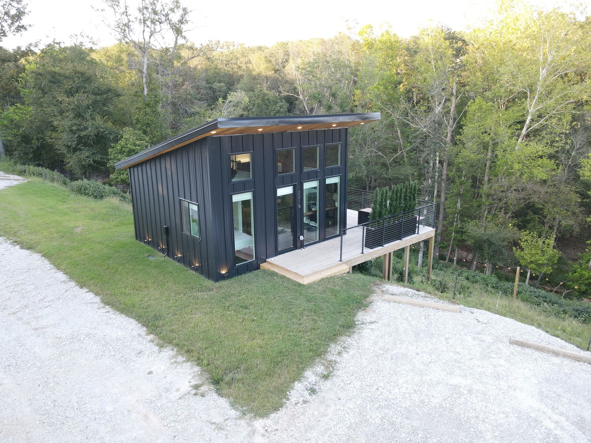 Aerial view of modern dark steel lean cottage — Siloam Springs Arkansas real build