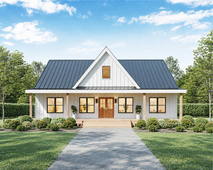 A front elevation photo of an large modern farmhouse style cabin with white board and batten exterior siding, black metal roof, and double wooden front entry doors.