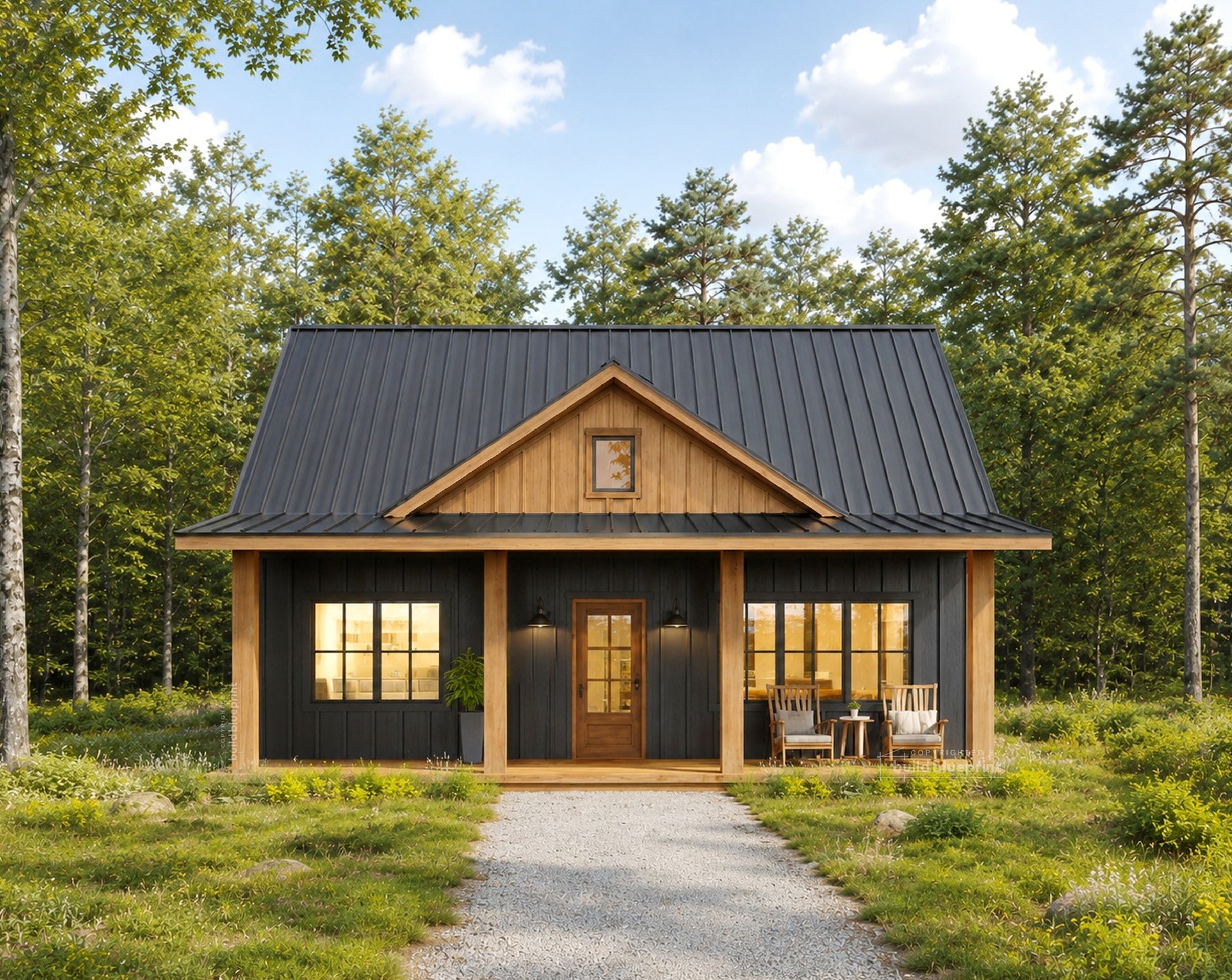 A modern single-story cabin with a dark metal roof, light wood siding, and a gravel path leading to the front porch, surrounded by a dense green forest under a blue sky.