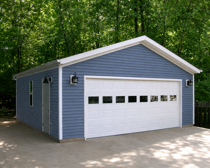 standard budget garage construction on concrete driveway